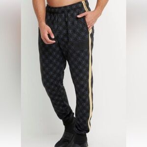 Champion World Class Classic Pants size Small with gold stripe on each side euc